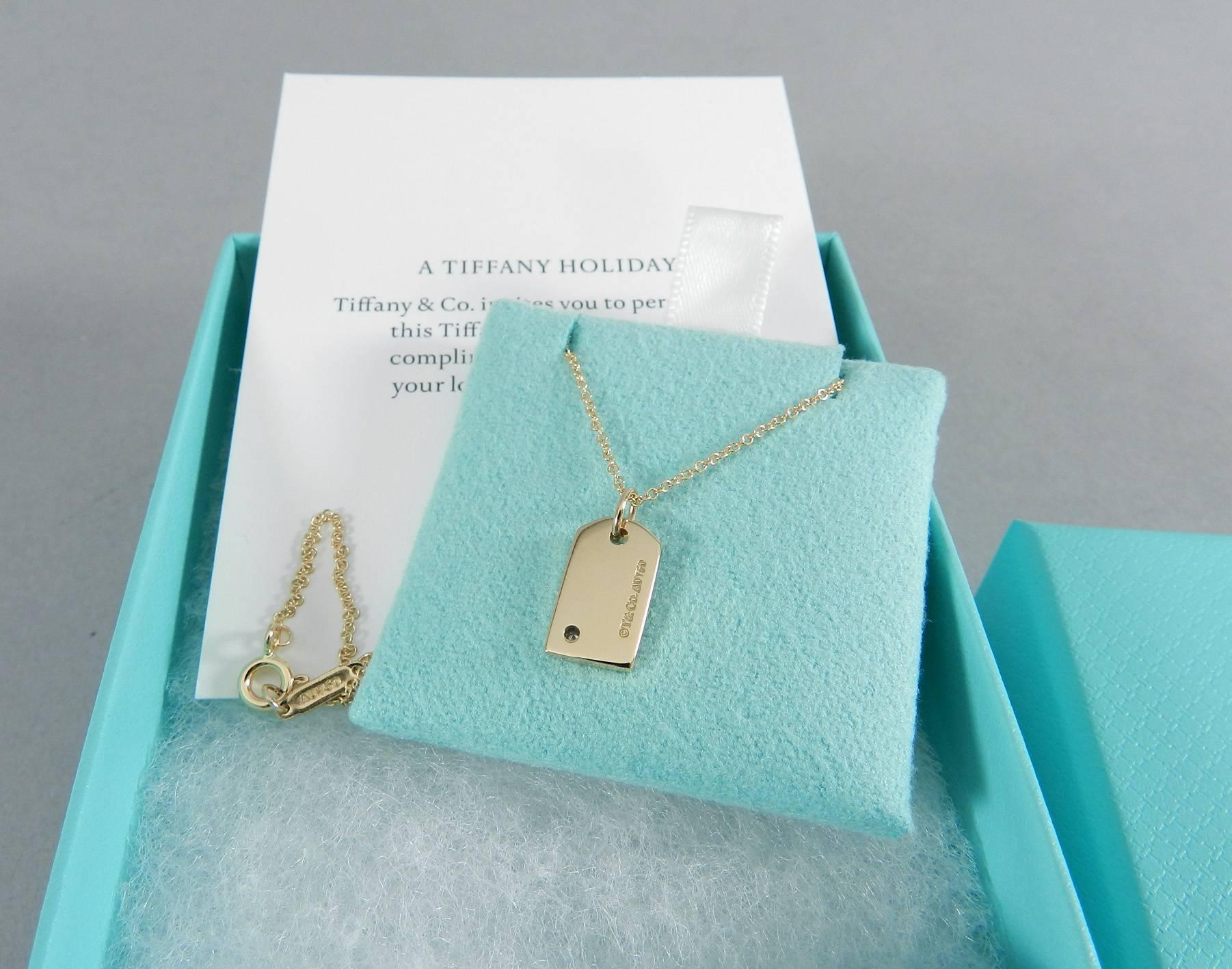 Tiffany & Co. Yellow Gold Mini Tag Charm Diamond Pendant Necklace In New Condition In Toronto, Ontario