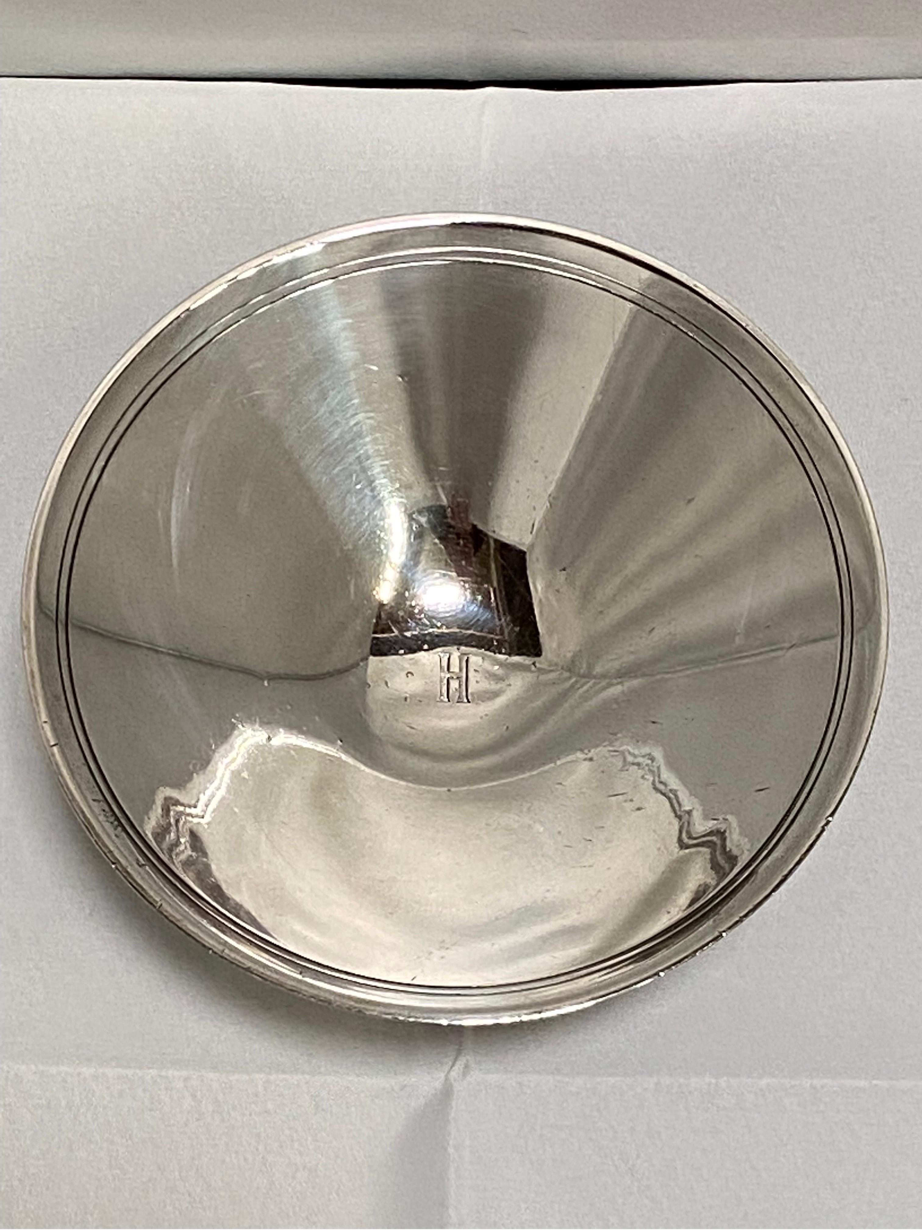 A vintage mid 20th Century, circa 1940’s, sterling silver footed bowl or compote dish made by Tiffany & Co. This piece exhibits the quality and design that Tiffany is known for throughout its history since the founding of the company in 1837. On the
