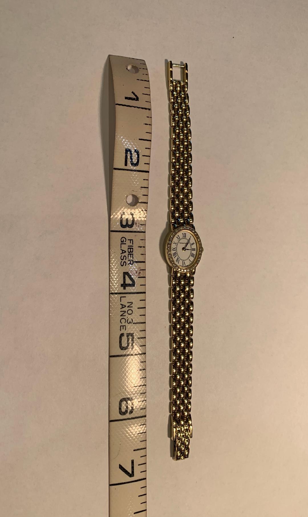 Tiffany & Co Ladies 14 Karat Yellow Gold Wristwatch with Diamond Bezel 9