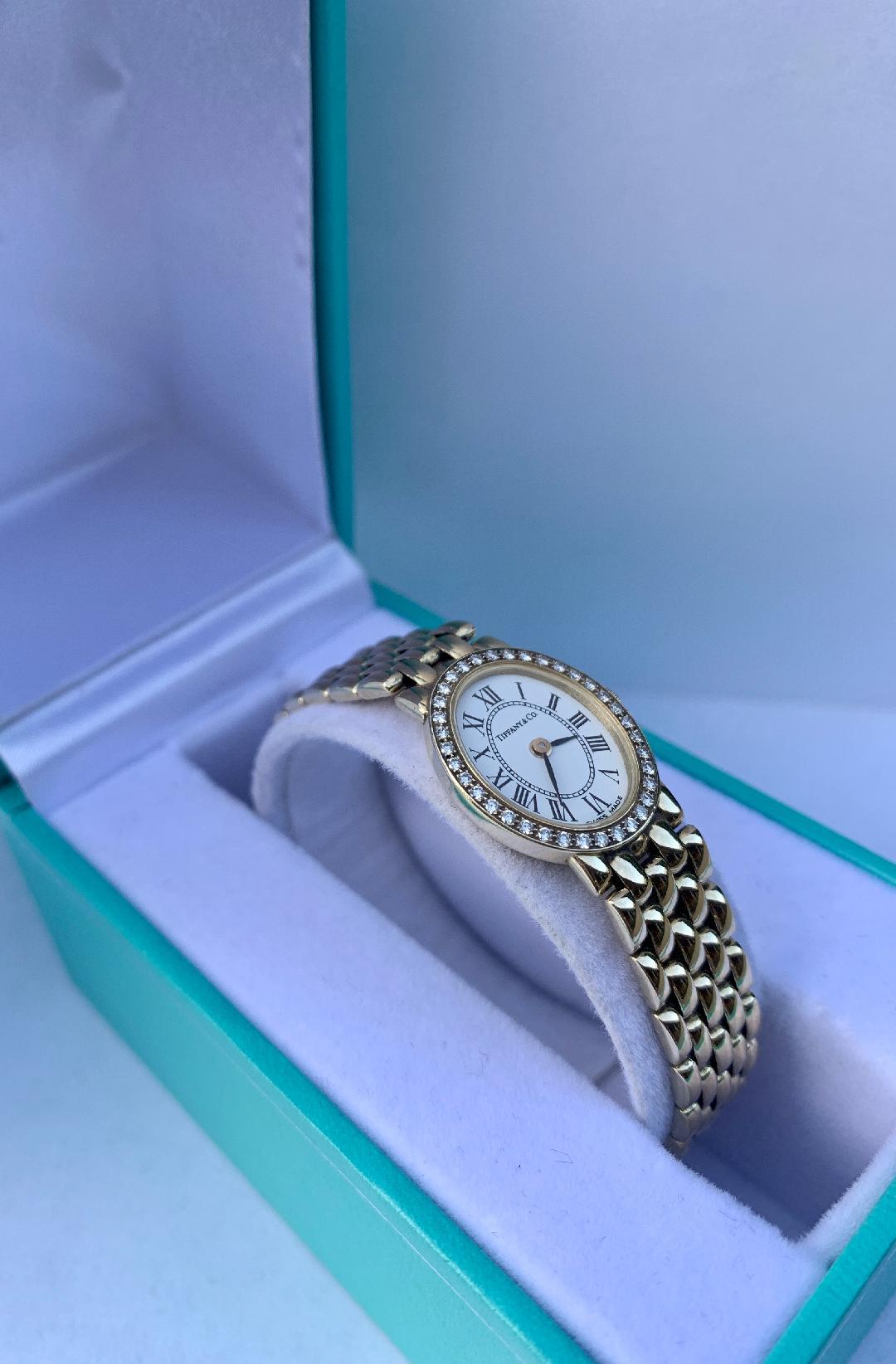 Tiffany & Co Ladies 14 Karat Yellow Gold Wristwatch with Diamond Bezel 10