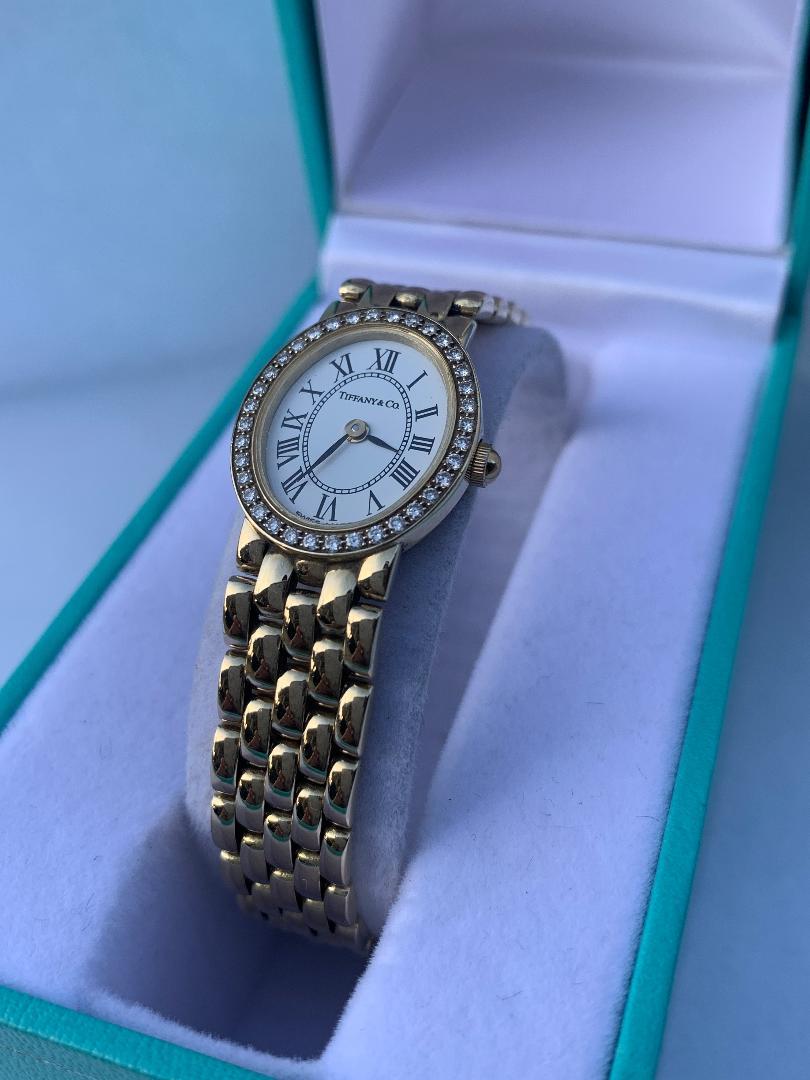 Tiffany & Co Ladies 14 Karat Yellow Gold Wristwatch with Diamond Bezel 11