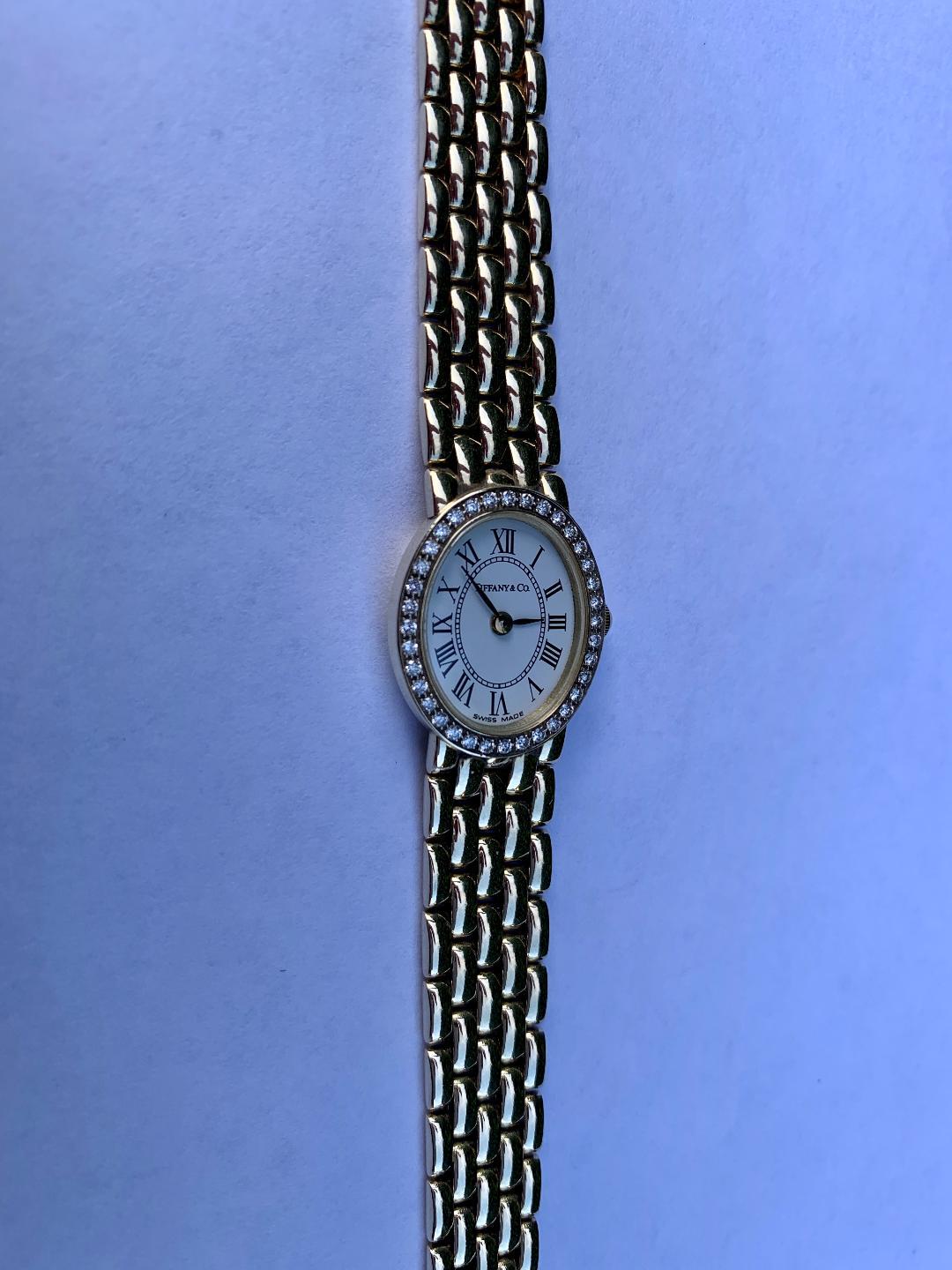 Tiffany & Co Ladies 14 Karat Yellow Gold Wristwatch with Diamond Bezel In Good Condition In Tustin, CA