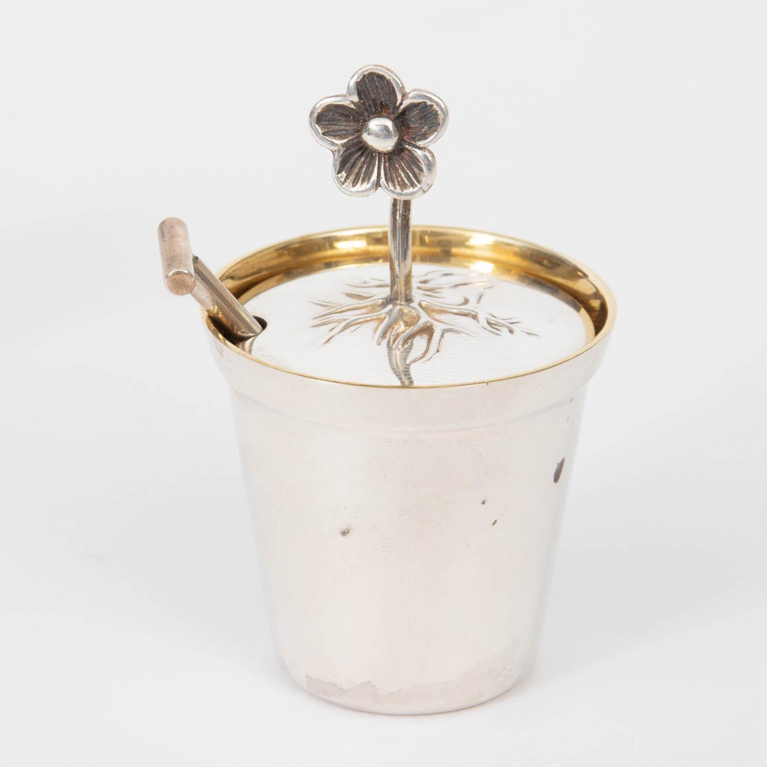 Tiffany & Co. miniature sterling silver watering can and flower pot with spade spoon, circa 20th century. Hallmarked sterling silver. Weight 75.5 Grams. Made in the United States. Please note of wear consistent with age. The bucket measures 1.00