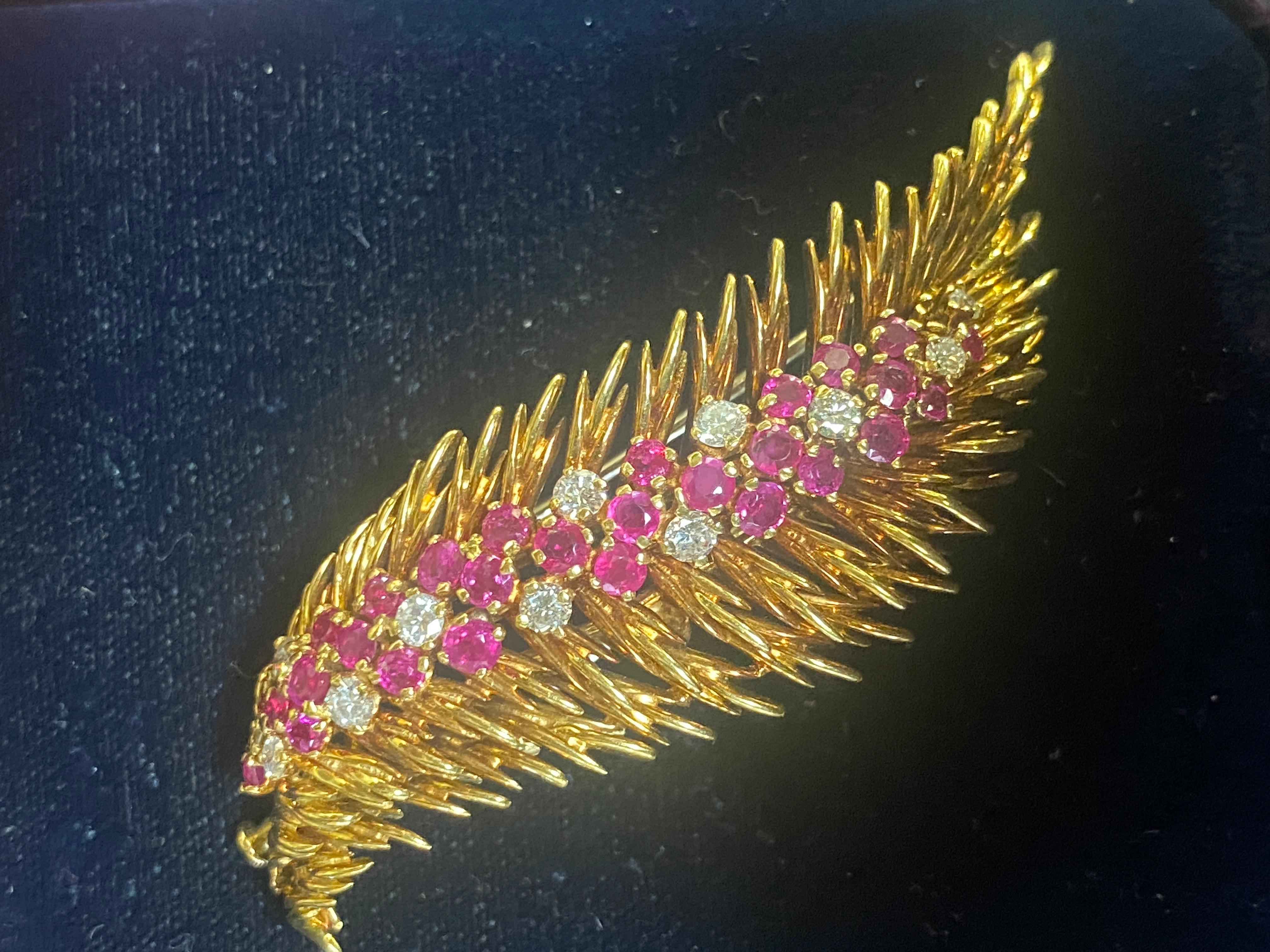 The allure of vintage jewelry lies in its ability to transcend time, capturing the essence of bygone eras. One such enchanting piece is this 18-carat gold vintage 1970's Tiffany & Co feather brooch adorned with round diamonds and round rubies. This