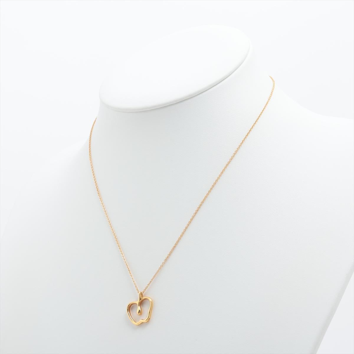 Brand : Tiffany&Co. 
Description: Tiffany Apple Necklace 
Metal Type:  750YG/ Yellow Gold
Total Weight:  3.9g
Condition: Preowned; small signs of wearing
Box -   Not Included
Papers -  Not Included
