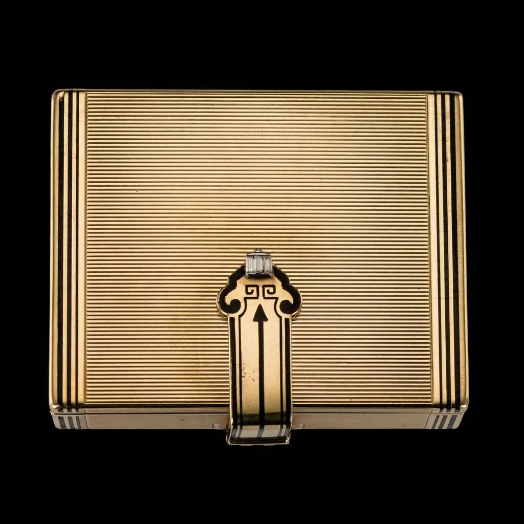Antique 20th century Tiffany Art Deco 14 carat gold compact, of rectangular form, unusual hinged clasp set with baguette diamonds, the redded box is partially decorated with black enamel. The inside of the cover is set with a mirror and contains a