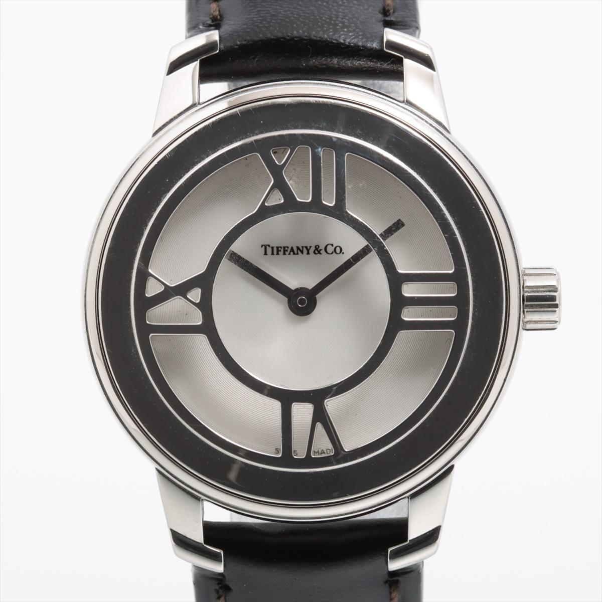 The Tiffany Atlas Stainless Steel Leather Watch in Black is a refined and elegant timepiece that blends timeless design with modern sophistication. Featuring a sleek stainless steel case, the watch boasts a striking silver white dial adorned with