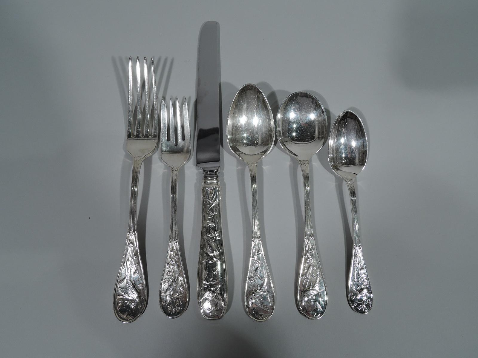 Wonderful sterling silver dinner service for 12 in Audubon pattern. Made by Tiffany & Co. in New York. This set comprises 83 pieces: Forks: 12 dinner forks (8 1/8) and 12 salad forks (6 3/4); Spoons: 11 soup spoons (7 1/4), 12 gumbo spoons (7), and