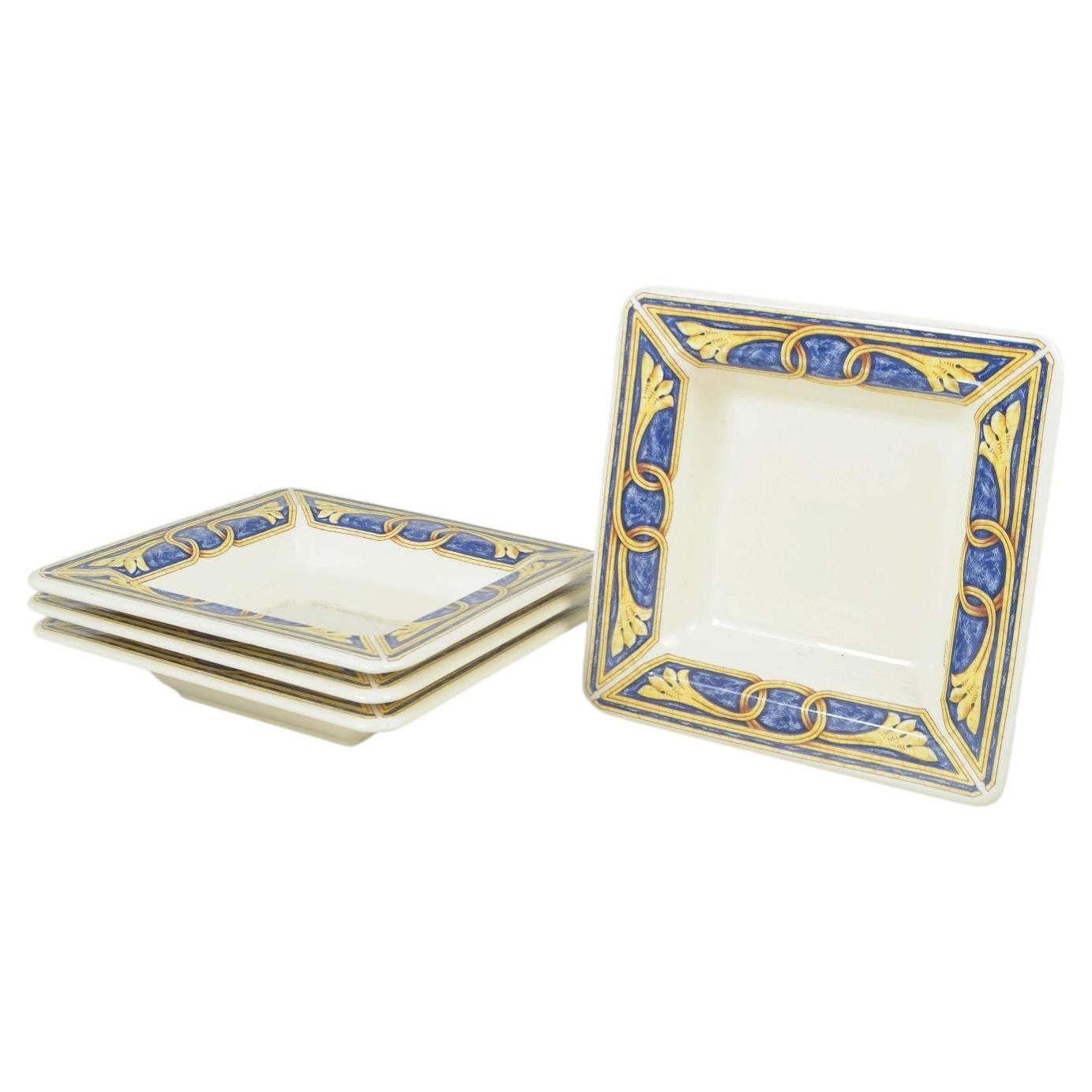 Tiffany Boutique, Italy. Set of four ceramic dinner plates, 1980s.