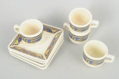 Tiffany Boutique. Set of four espresso cups with saucers with ornamental motifs.