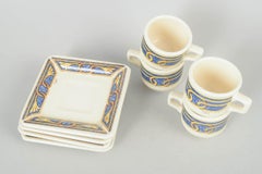 Boutique Tiffany. Juego de cuatro tazas de café expreso con platillos con motivos ornamentales.