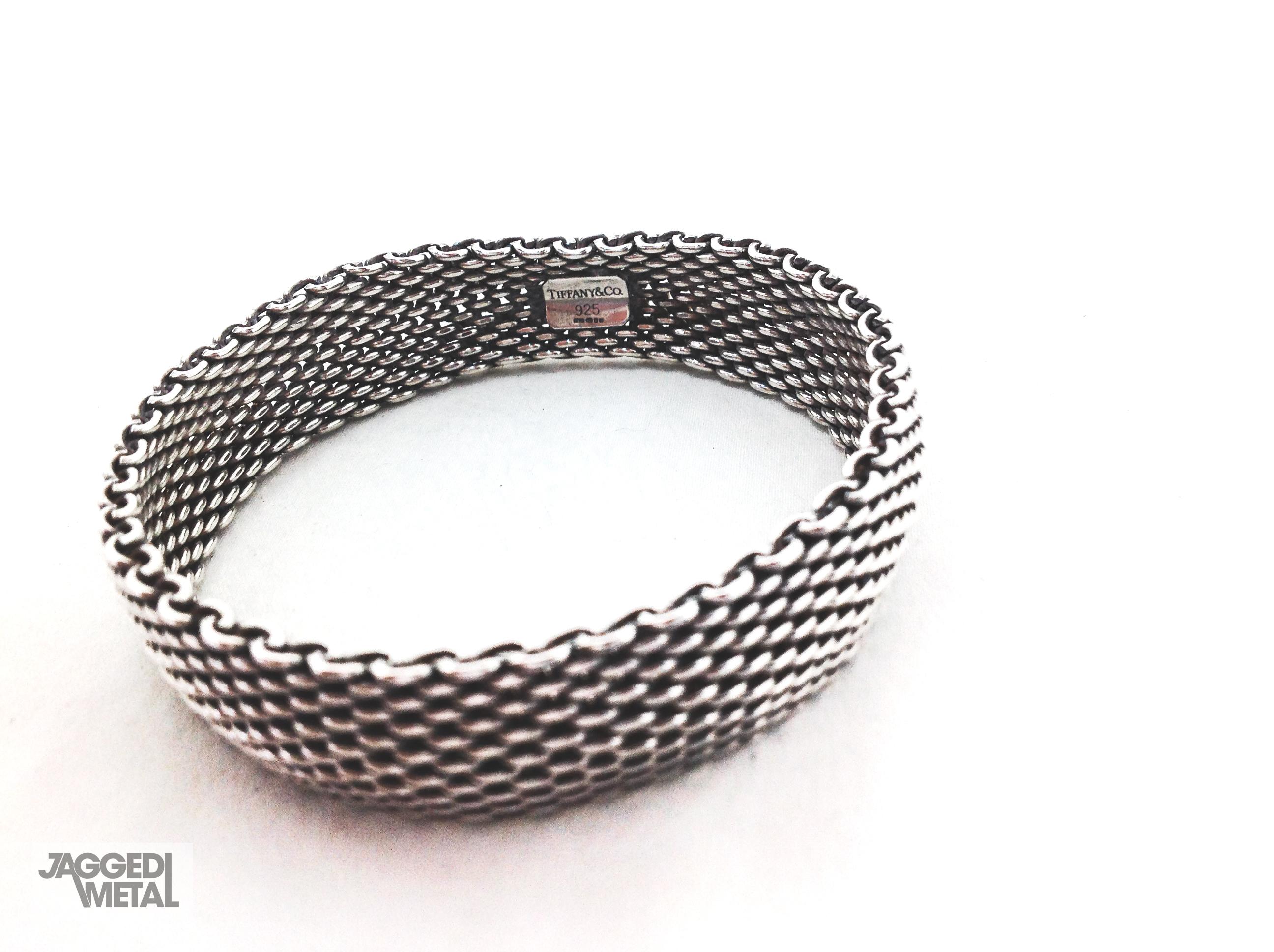 Tiffany Bracelet Somerset Sterling Silver 

Tiffany & Company Somerset Mesh Weave Bangle Bracelet. 

Detail
-Made in the early 2000s, cast from sterling silver
-Mesh weave texture

Size & Fit
-Height: 0.6 in. (15.24 mm)
-Diameter: 2.5 in. (63.5 mm),