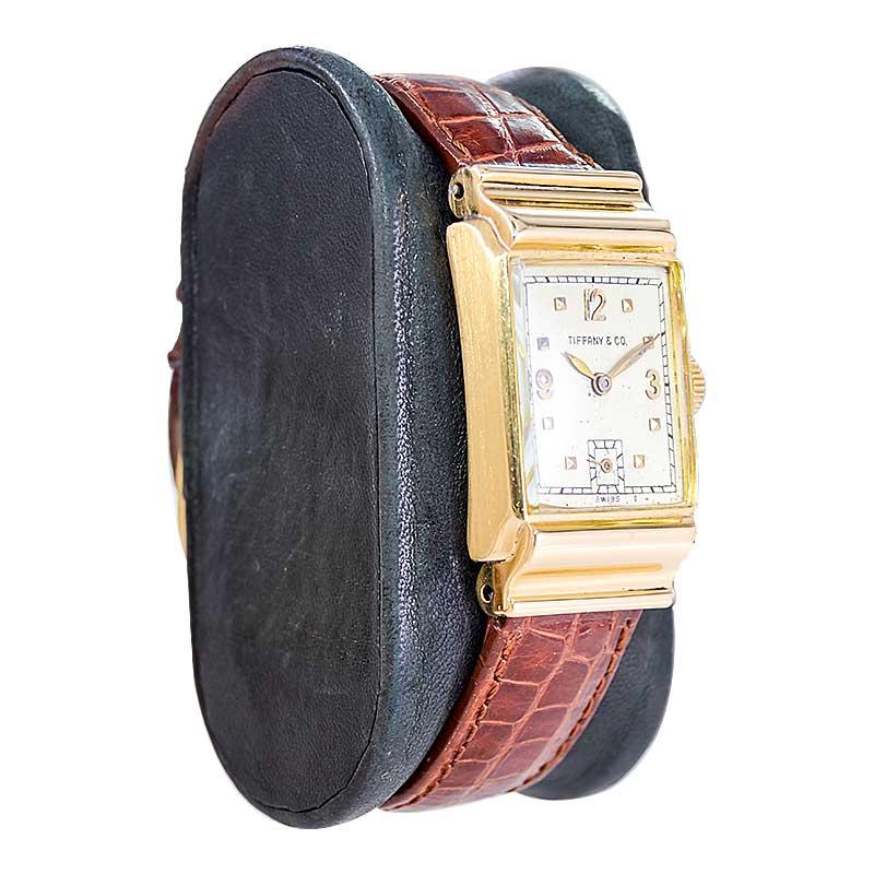 FACTORY / HOUSE: International Watch Company for Tiffany & Co. 
STYLE / REFERENCE: Art Deco 
METAL / MATERIAL: 14kt
CIRCA / YEAR: 1940's
DIMENSIONS / SIZE: Length 38mm X Width 22mm
MOVEMENT / CALIBER: Manual Winding / 17 Jewels 
DIAL / HANDS: