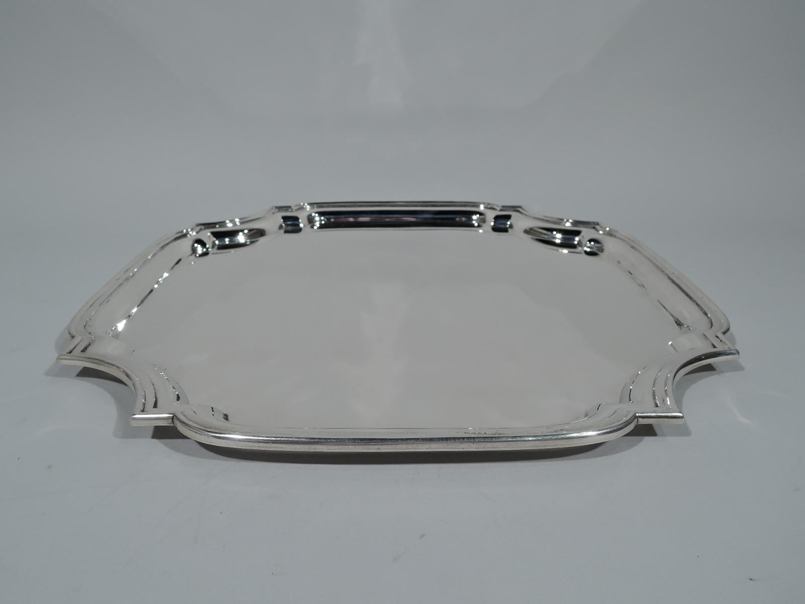 Classic Georgian-style sterling silver cartouche tray. Made by Tiffany & Co. in New York. Four sides with concave corners and molded rim. Hallmark includes postwar pattern no. 25146. Heavy weight: 46.5 troy ounces.