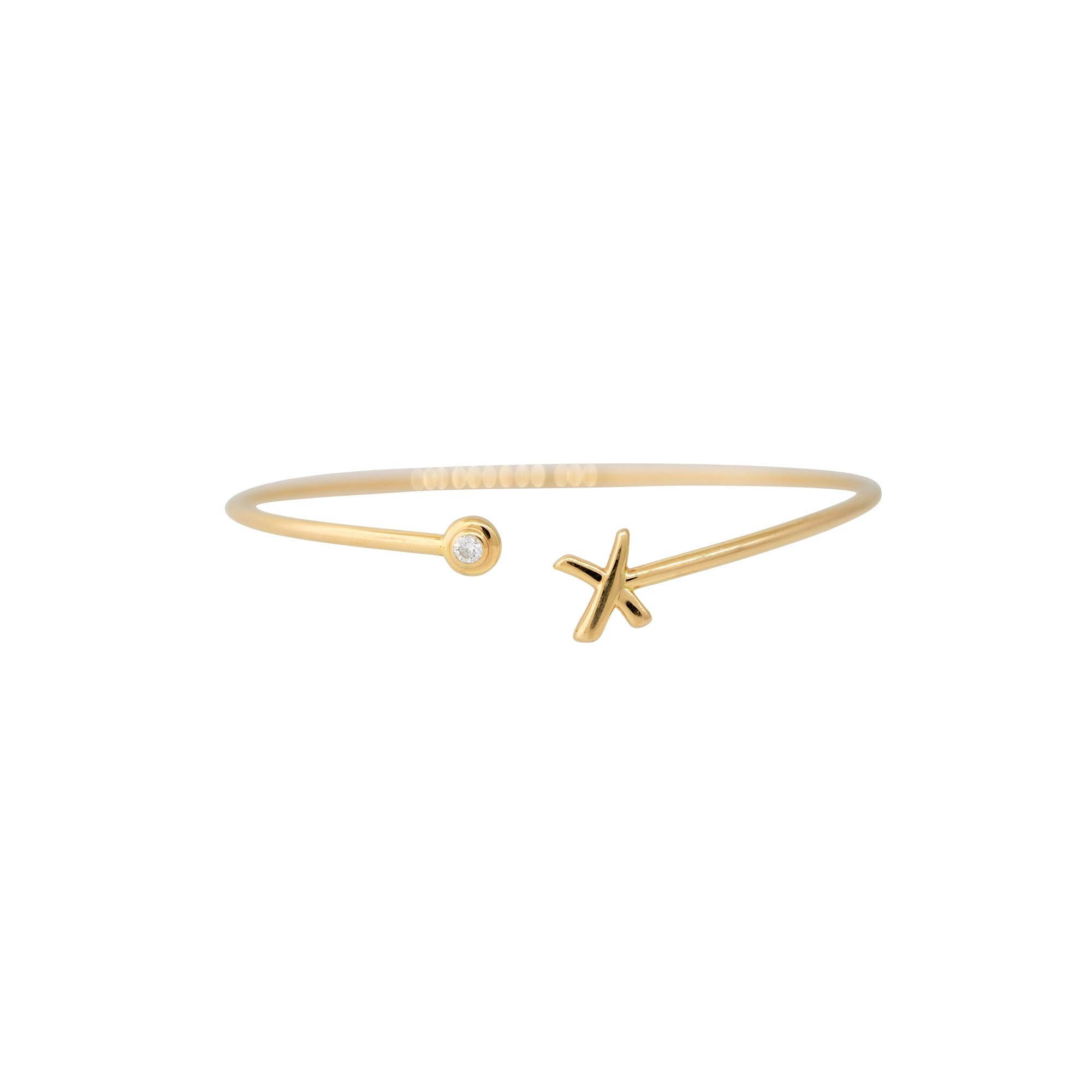 Bracelet manchette ouvert en or jaune 18k de Tiffany & Co. avec 0,05ctw de diamant 