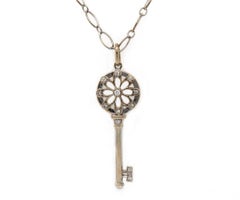 Tiffany & Co 0.06 CTW Diamond Key Flower Pendant Necklace in Sterling