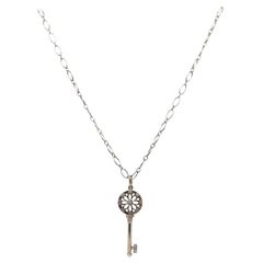 Tiffany & Co 0.06 CTW Diamond Key Flower Pendant Necklace in Sterling