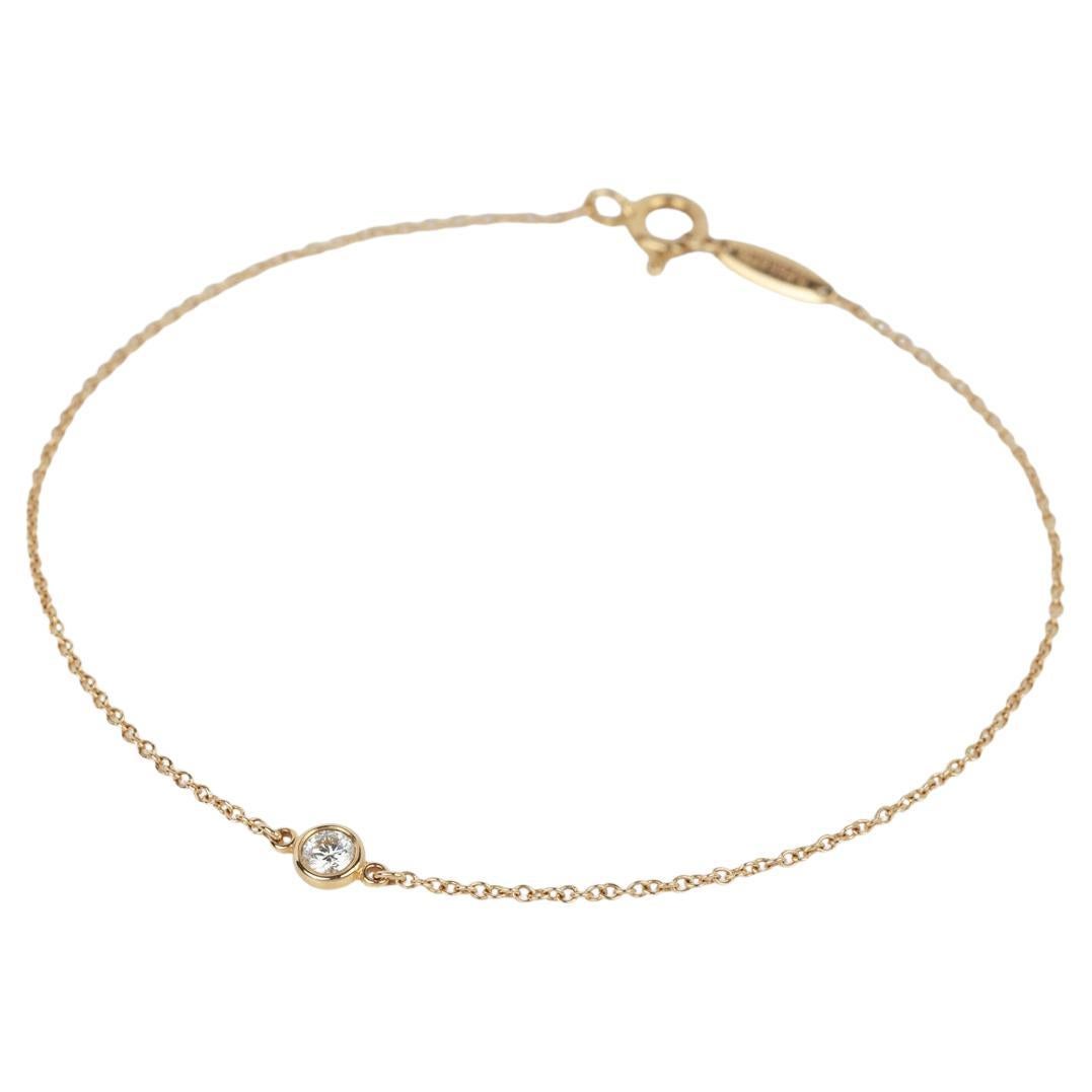 Tiffany 
Co. Diamante Elsa Peretti de 0,08 ct talla brillante de oro amarillo de 18 ct por el