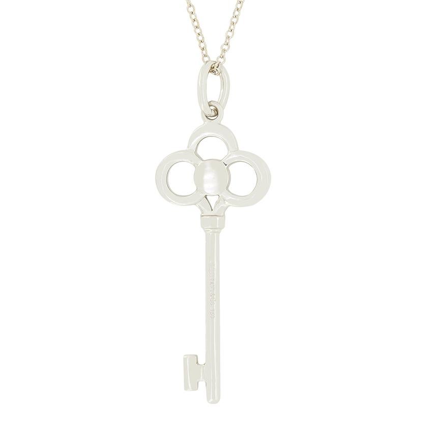 This sparkling diamond pendant comes from Tiffany & Co.’s Iconic key collection. Named the Crown Key, this pendant features a collection of round brilliant diamonds, pavé set across its design. Totalling 0.11 carat, the diamonds are all of high