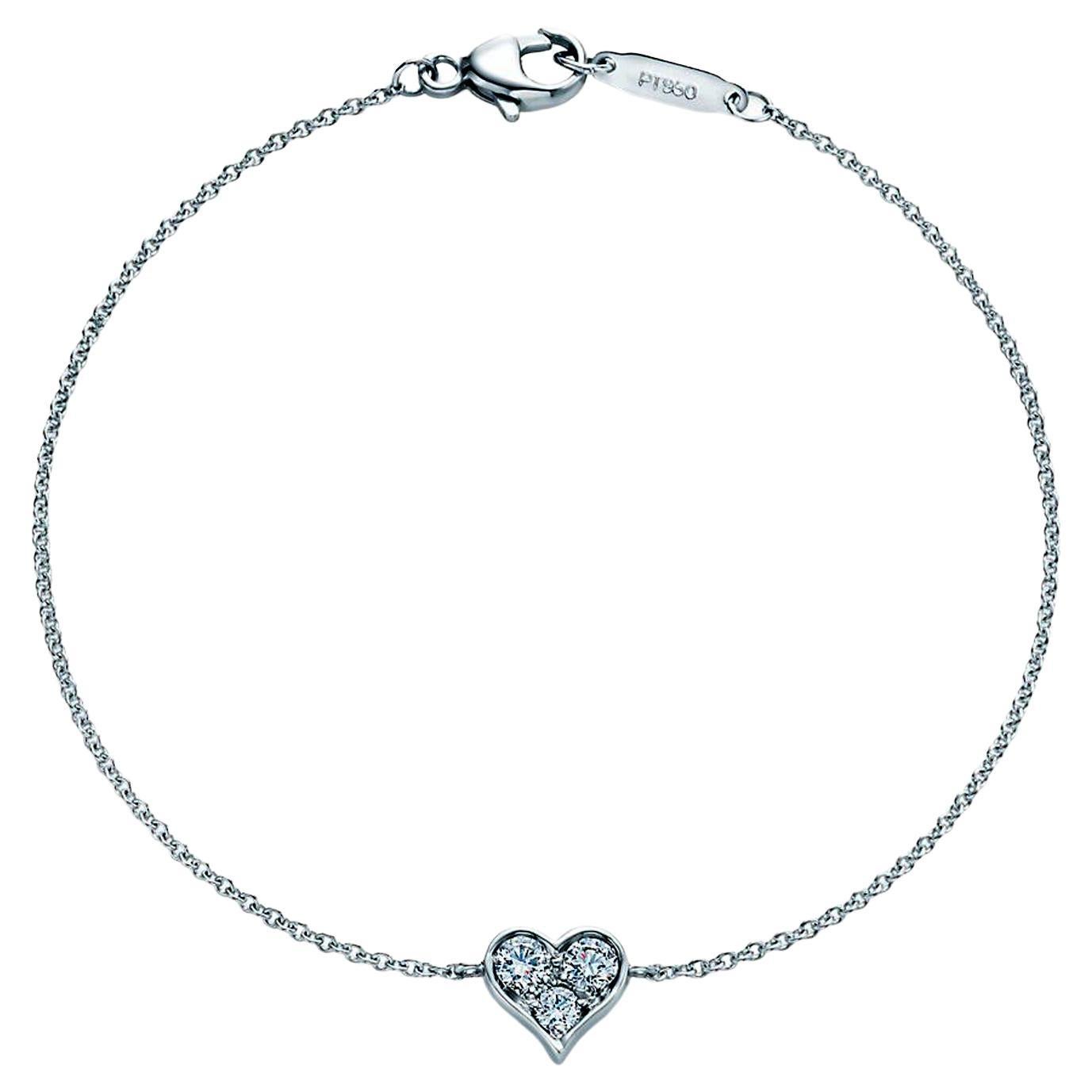 Platinarmband von Tiffany & Co. mit 0,18 Karat 3 Herzen und runden Brillanten und runden Diamanten
