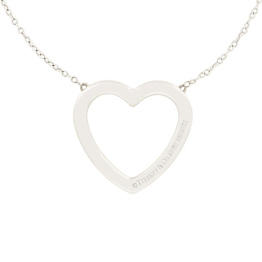 From the designer Tiffany & Co. comes this Heart Necklace from their 'Metro' collection. The heart shape pendant is adorned with 86 dazzling diamonds, arranged in two sparkling rows. Totalling 0.43 carat, the diamonds are of high quality with an F