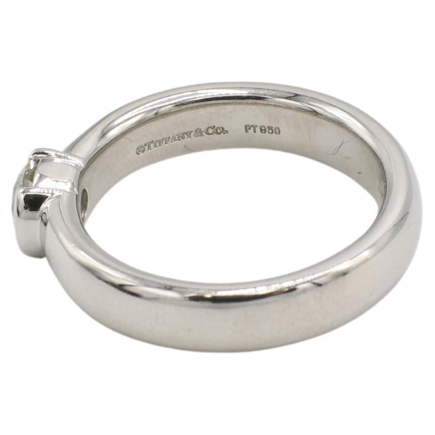 Tiffany & Co. 0.44 Carat H VS2 Platinum Round Natural Diamond Engagement Ring 
Metal: Platinum
Weight: 9.68 grams
Diamnd: 0.44 carat round H VS2 natural diamond
Size: 6 (US)
Signed: ©Tiffany & Co. PT950 18533111 .44 CT
Height: 4mm
Band: 4mm
