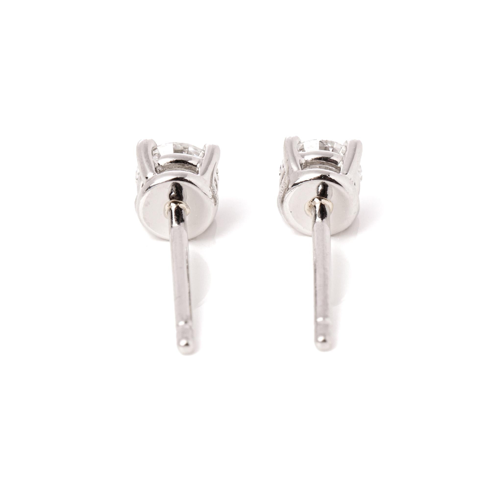 Contemporary Tiffany & Co. 0.48ct Solitaire Diamond Stud Earrings
