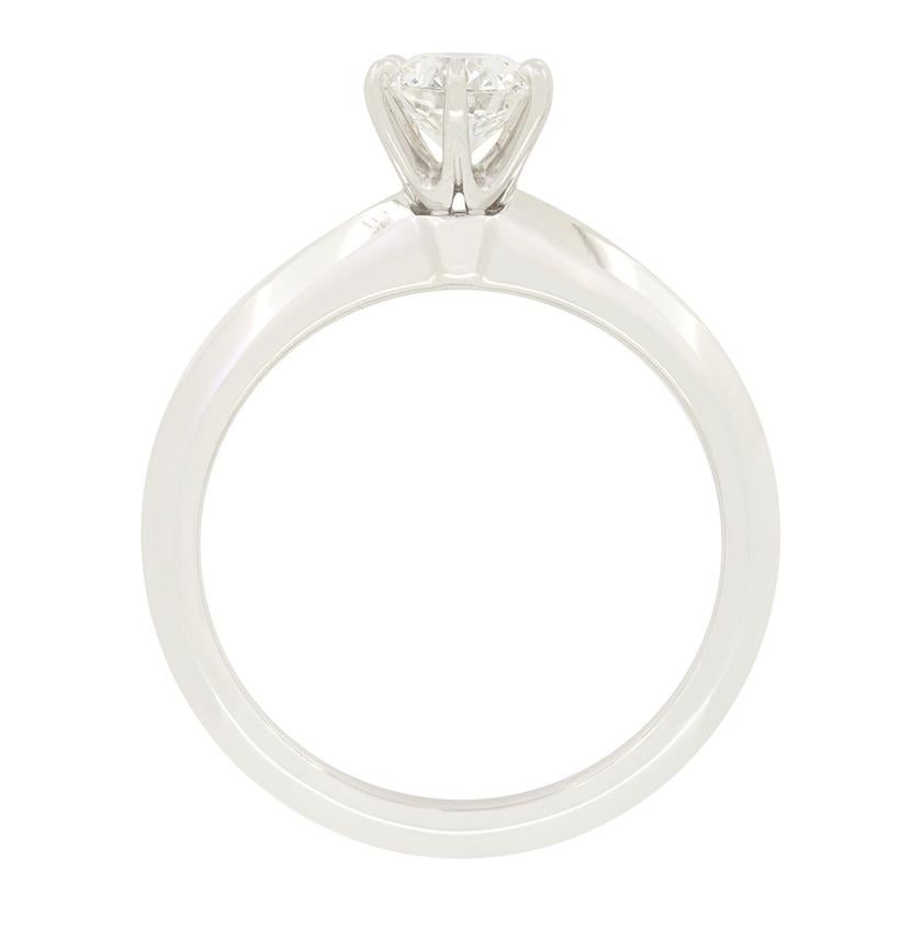 From the designer Tiffany & Co. comes this iconic knife edge solitaire ring featuring a wonderful 0.54 carat, round brilliant diamond at it’s centre. The claw set diamond has being graded H in colour and VS1 in clarity. The knife edge band is