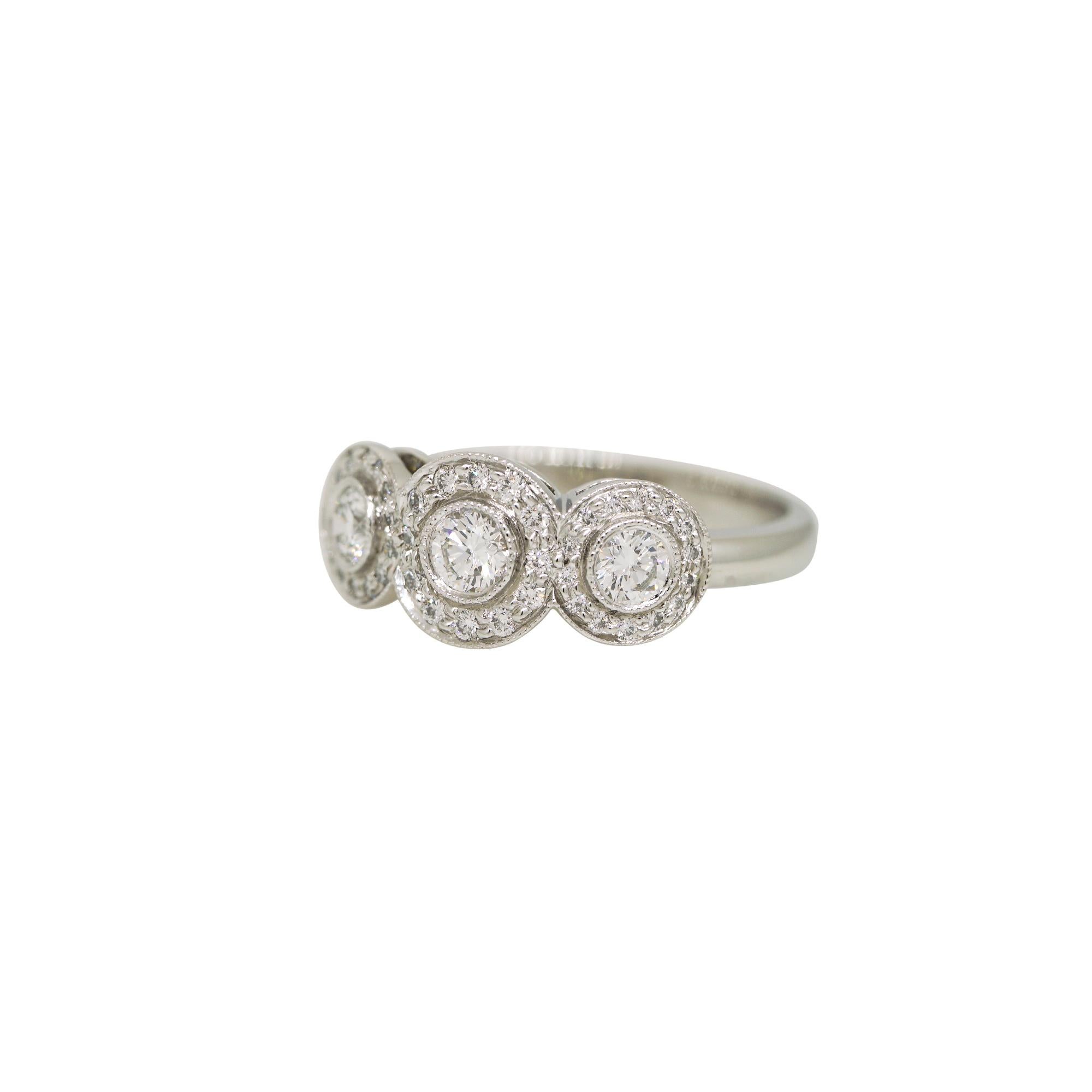 Modern Tiffany & Co. Natural 0.55 Carat Diamond Halo 3 Circle Platinum Ring In Stock For Sale
