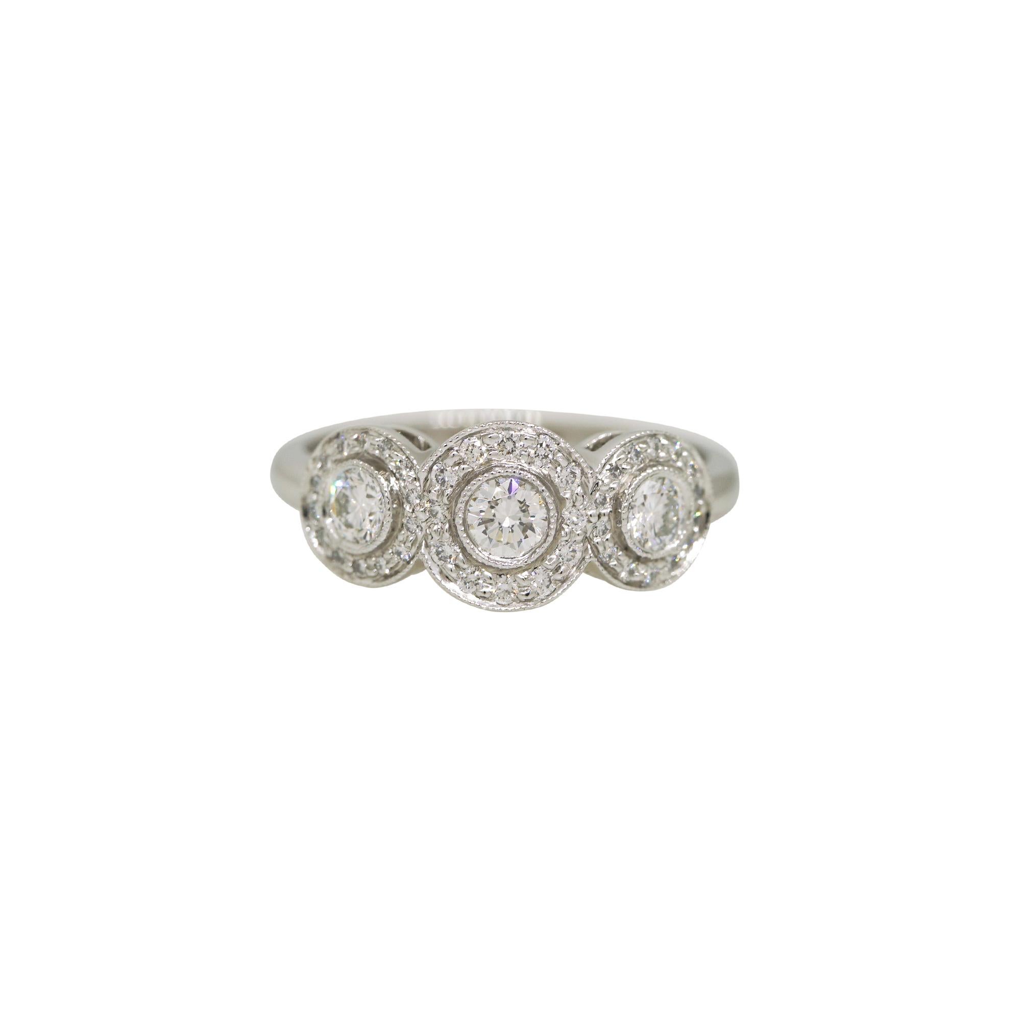 Round Cut Tiffany & Co. Natural 0.55 Carat Diamond Halo 3 Circle Platinum Ring In Stock For Sale