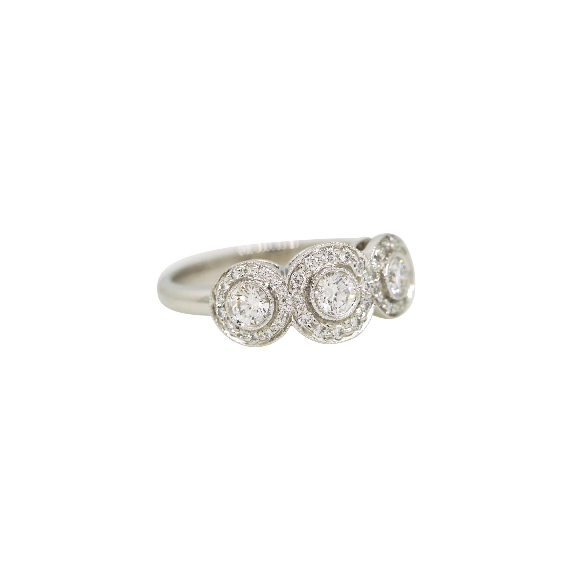 Women's Tiffany & Co. Natural 0.55 Carat Diamond Halo 3 Circle Platinum Ring In Stock For Sale
