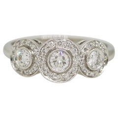 Tiffany & Co. Natural 0.55 Carat Diamond Halo 3 Circle Platinum Ring In Stock