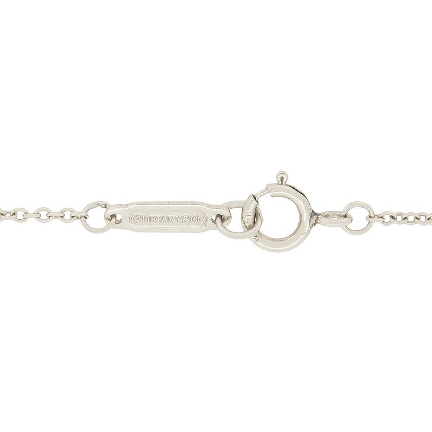 Taglio brillante Tiffany & Co. Ciondolo a forma di cerchio con diamante da 0,55 carati e tripla aureola in vendita