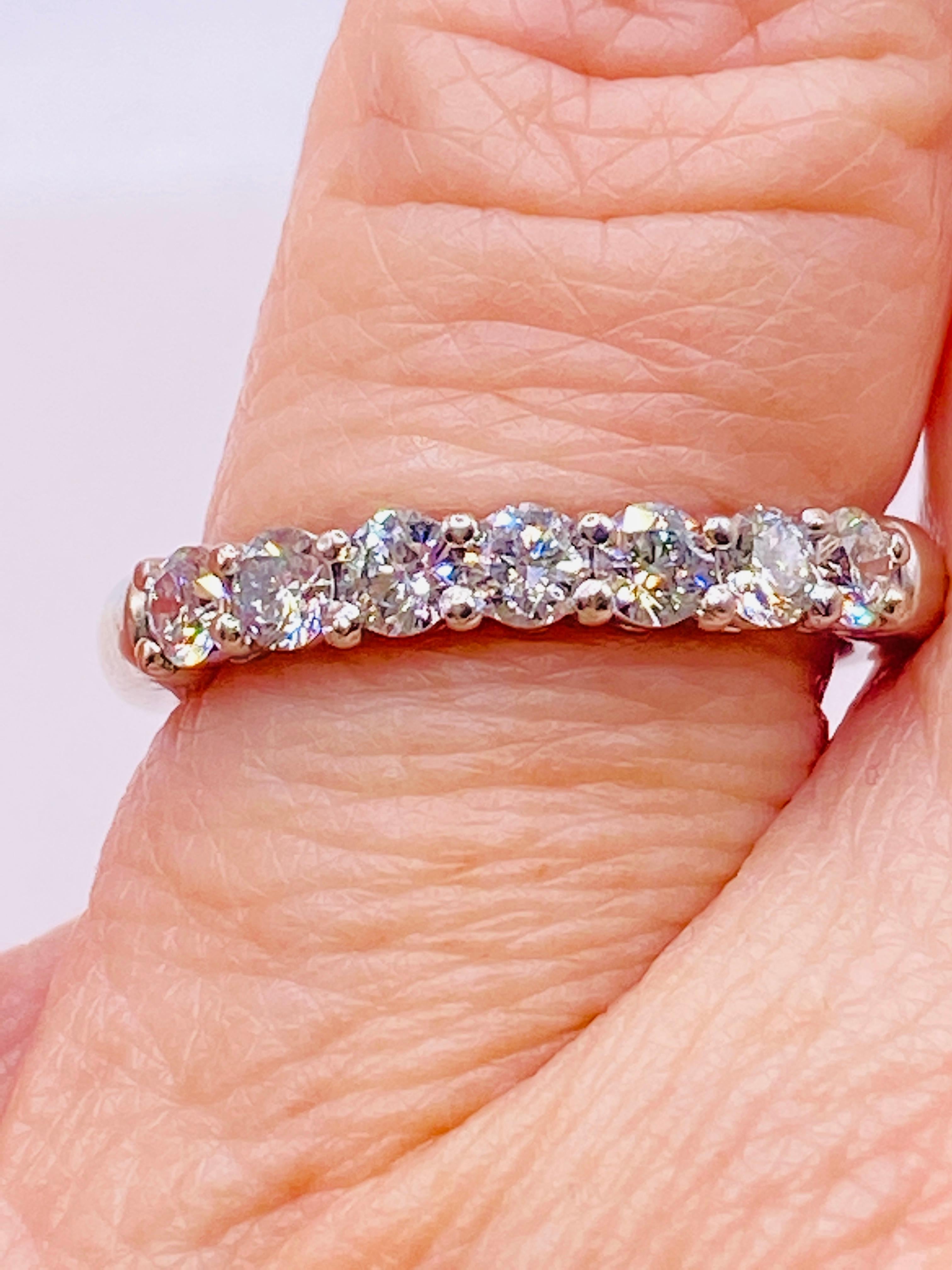 Brilliant Cut Tiffany & Co 0.57 Carat Diamond Platinum Embrace Ring For Sale