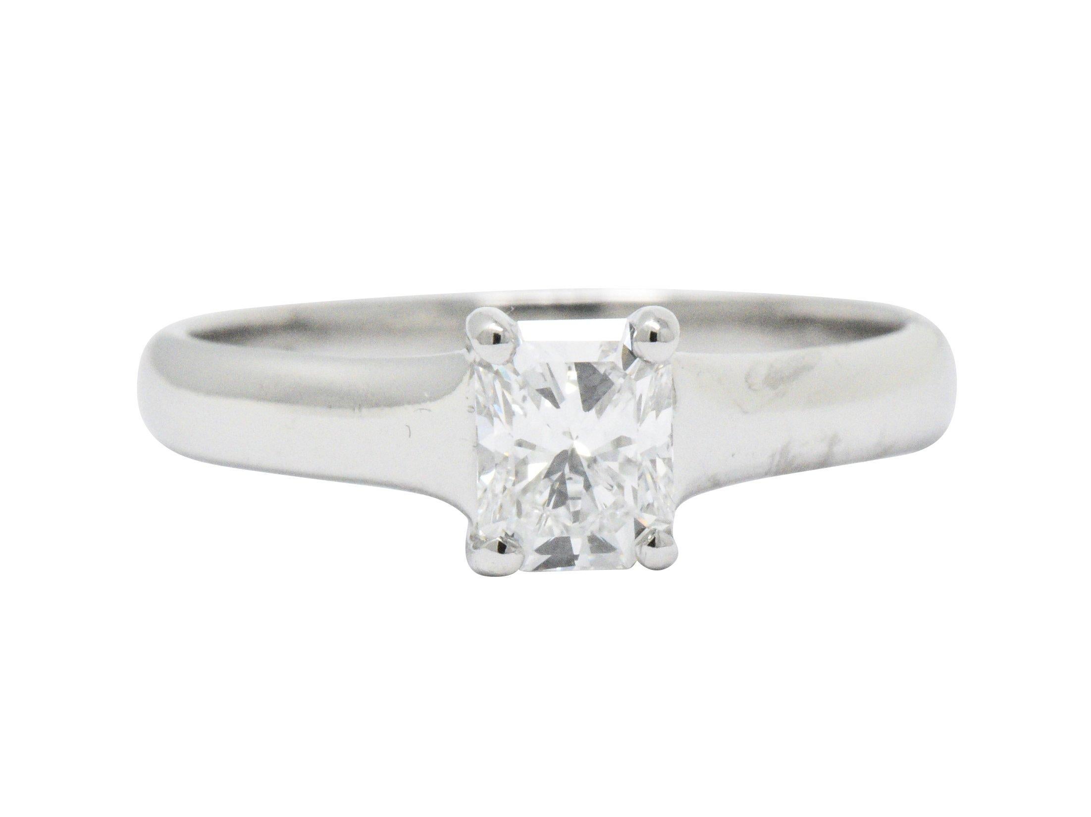 Centering an internally flawless radiant cut Lucida diamond weighing 0.59 carat with remarkable F color

Diamond is laser inscribed 'Lucida' and with the GIA and Tiffany registration numbers

Prong set in a cathedral style mounting that features a