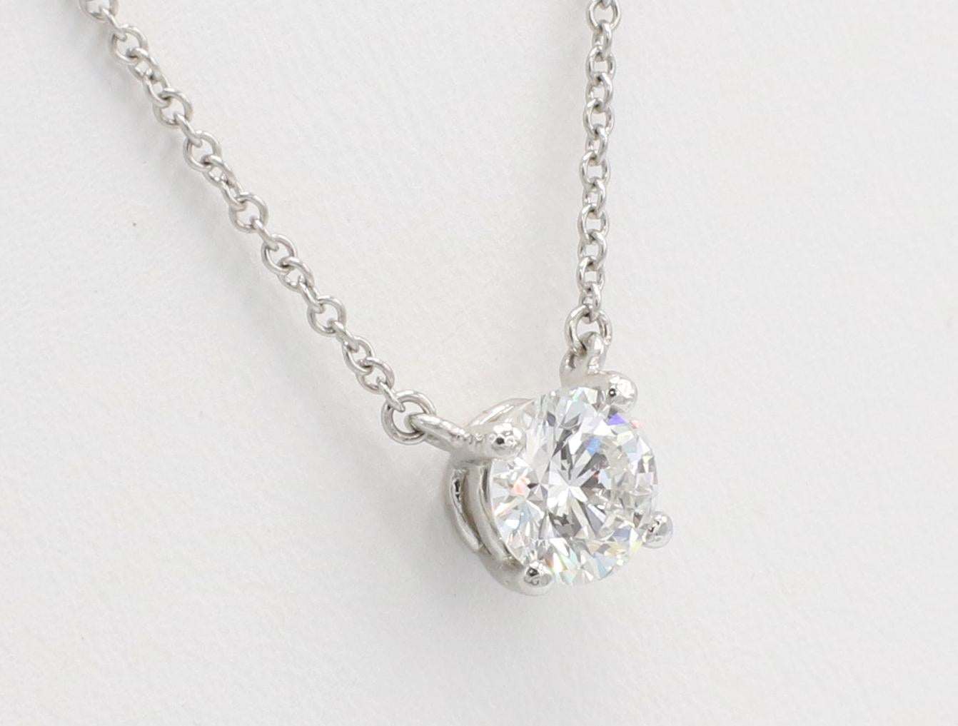 Modern Tiffany & Co. 0.72 Carat F Vvs2 Round Natural Diamond Platinum Pendant Necklace