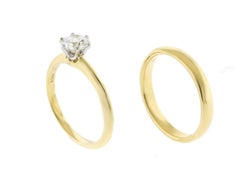 Tiffany & Co. 0.75ct Diamond 18 karat Wedding Set – Knife-Edge Solitaire & Band