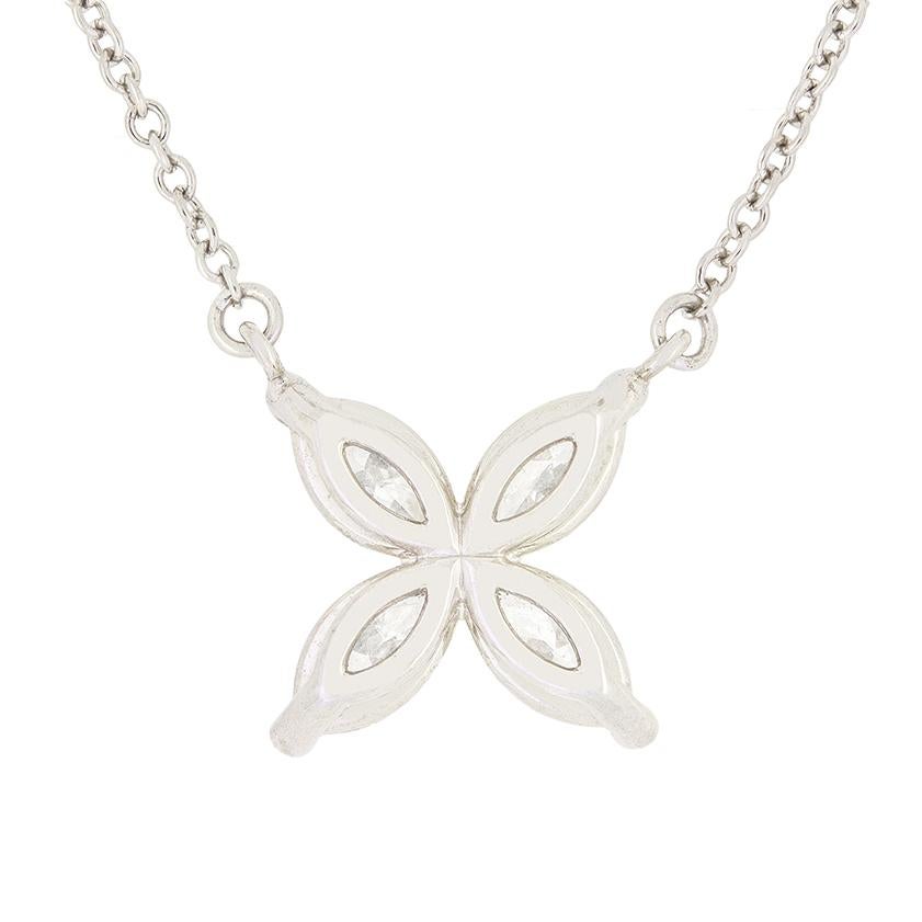 This exquisite pendant necklace comes from the designer Tiffany & Co. and their Victoria collection. Featuring four marquise-cut diamonds totalling 0.81 carat, each stone is perfectly matched at F in colour and VVS clarity. The diamonds are claw set