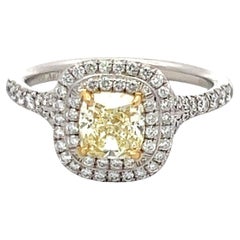 Tiffany & Co Anillo de compromiso con diamante amarillo fantasía engarzado de 0,90 quilates, 18 quilates/plata