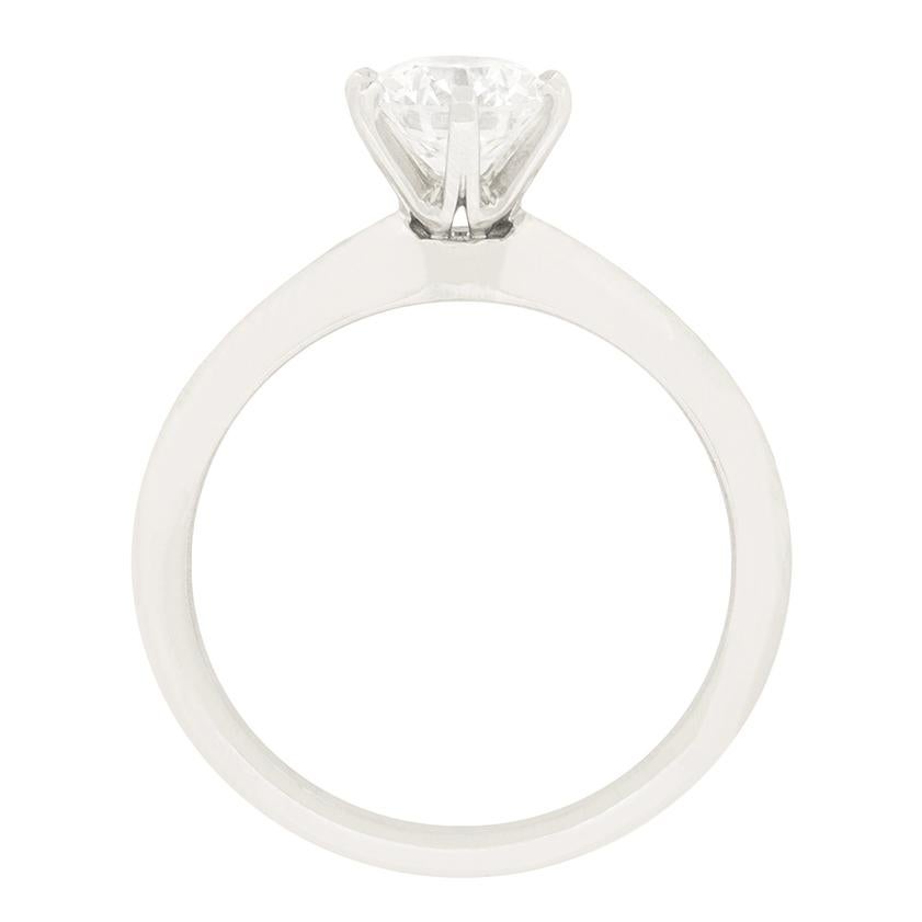 From the makers at Tiffany & Co. comes this iconic knife edge solitaire ring featuring a stunning 0.95 carat diamond at it’s centre. The Diamond is of typical Tiffany & Co. quality, being graded E in colour and VVS2 in clarity. The band is crafted