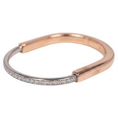 Bracciale rigido con chiusura a lucchetto e diamante da 1 carato di Tiffany & Co. in oro rosa 18k