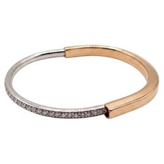 Tiffany & Co. 1 Carat Diamond Rose and White Gold Lock Bangle Bracelet