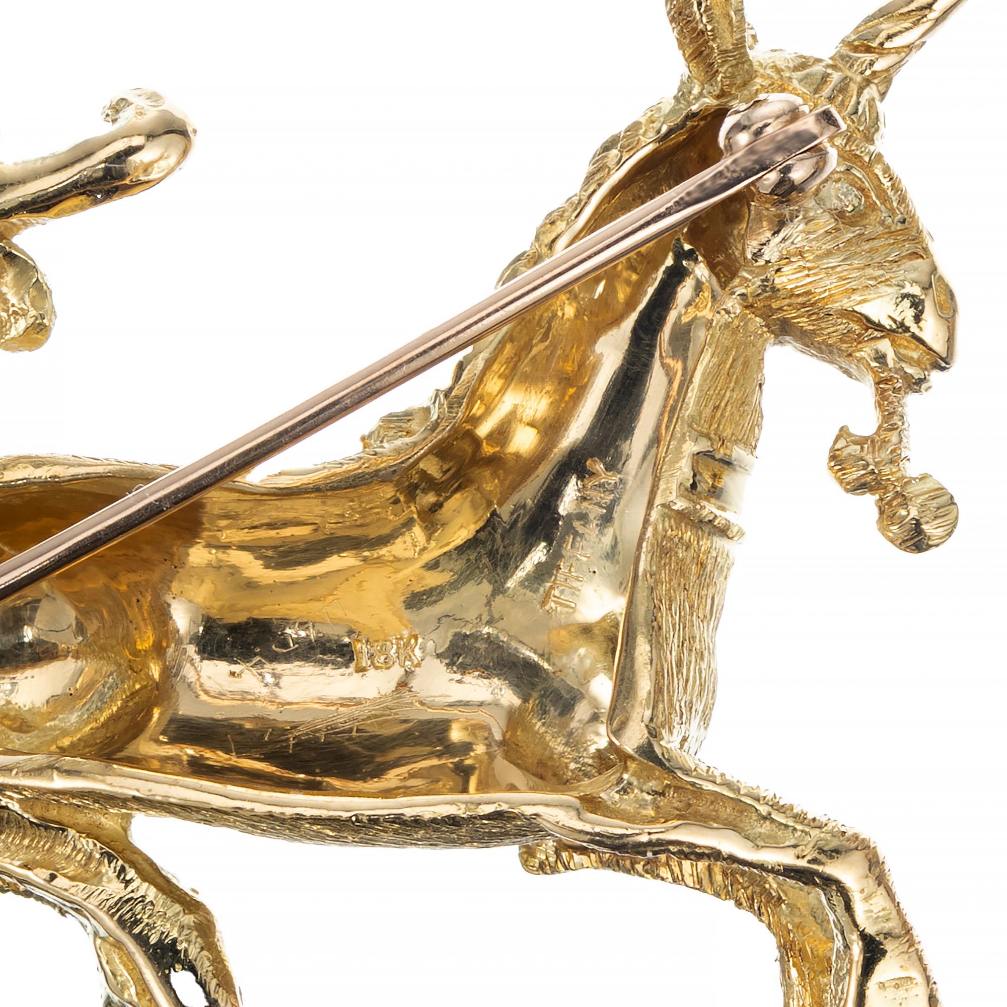 Round Cut Tiffany & Co .1 Carat Ruby Yellow Gold Unicorn Brooch For Sale