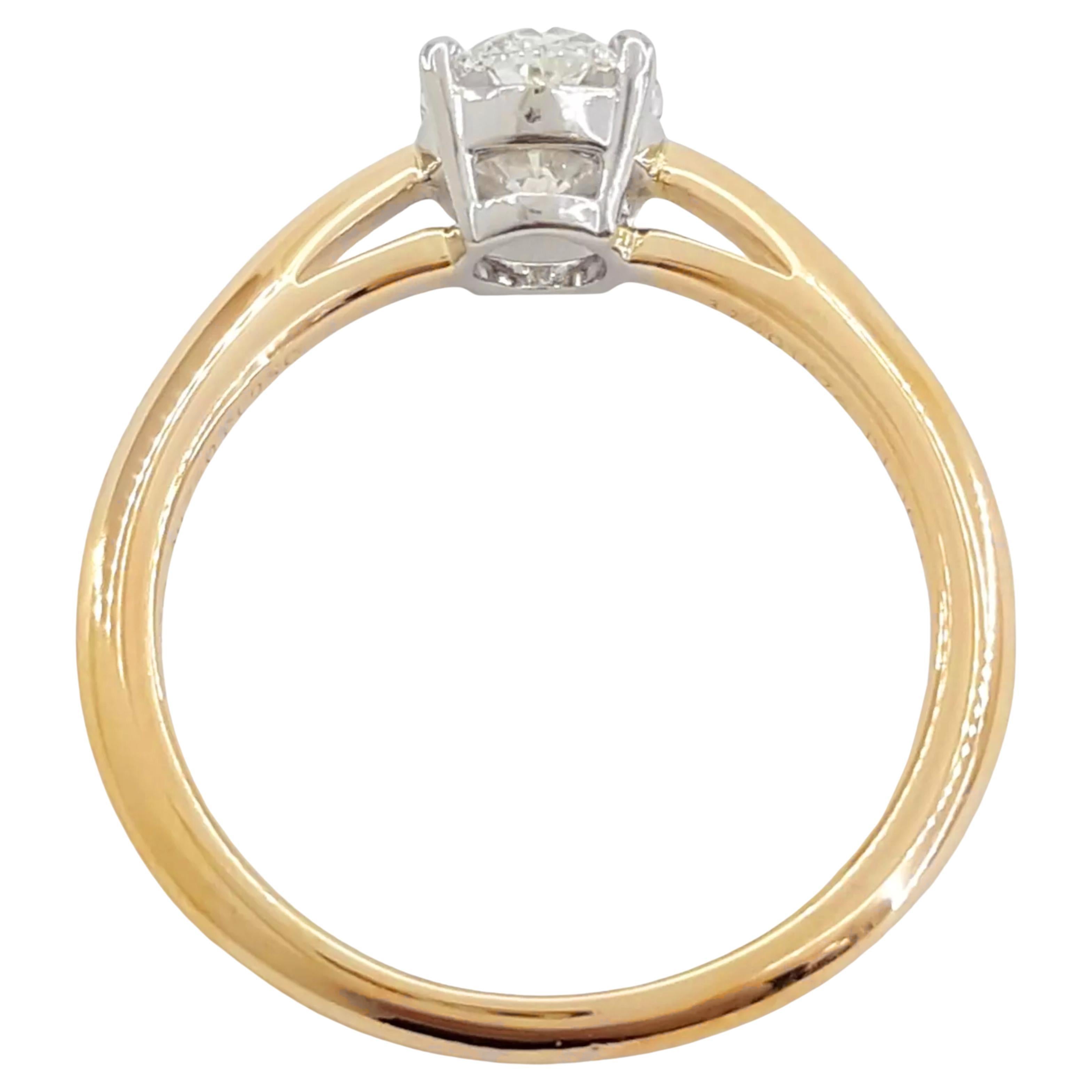 Bague de fiançailles solitaire à diamant ovale de 1 ct de Tiffany & Co., magnifiquement réalisée en or rose 18 carats et en platine. D'un poids de 3 grammes et d'une taille de 6, le centre est orné d'un superbe diamant naturel de taille ovale et