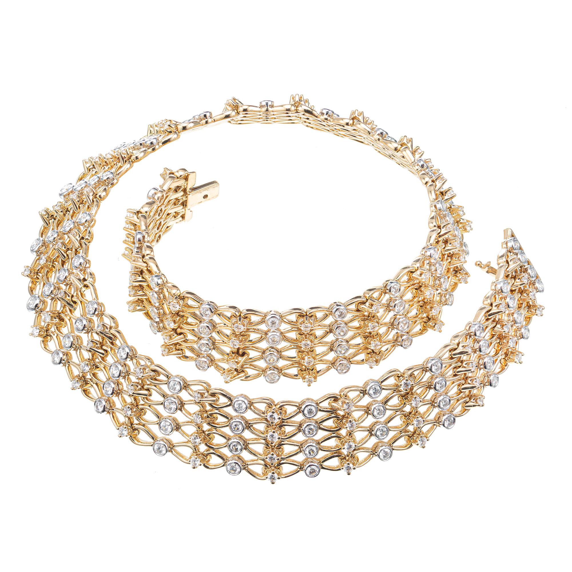 224 round brilliant cut diamond 18-Inch-long, 18k yellow gold and platinum collar style necklace. 

112 round brilliant cut diamonds G VS, approx. 6.84cts
112 round brilliant cut diamonds G VS, approx. 3.36cts 
18k yellow gold 
Platinum 750