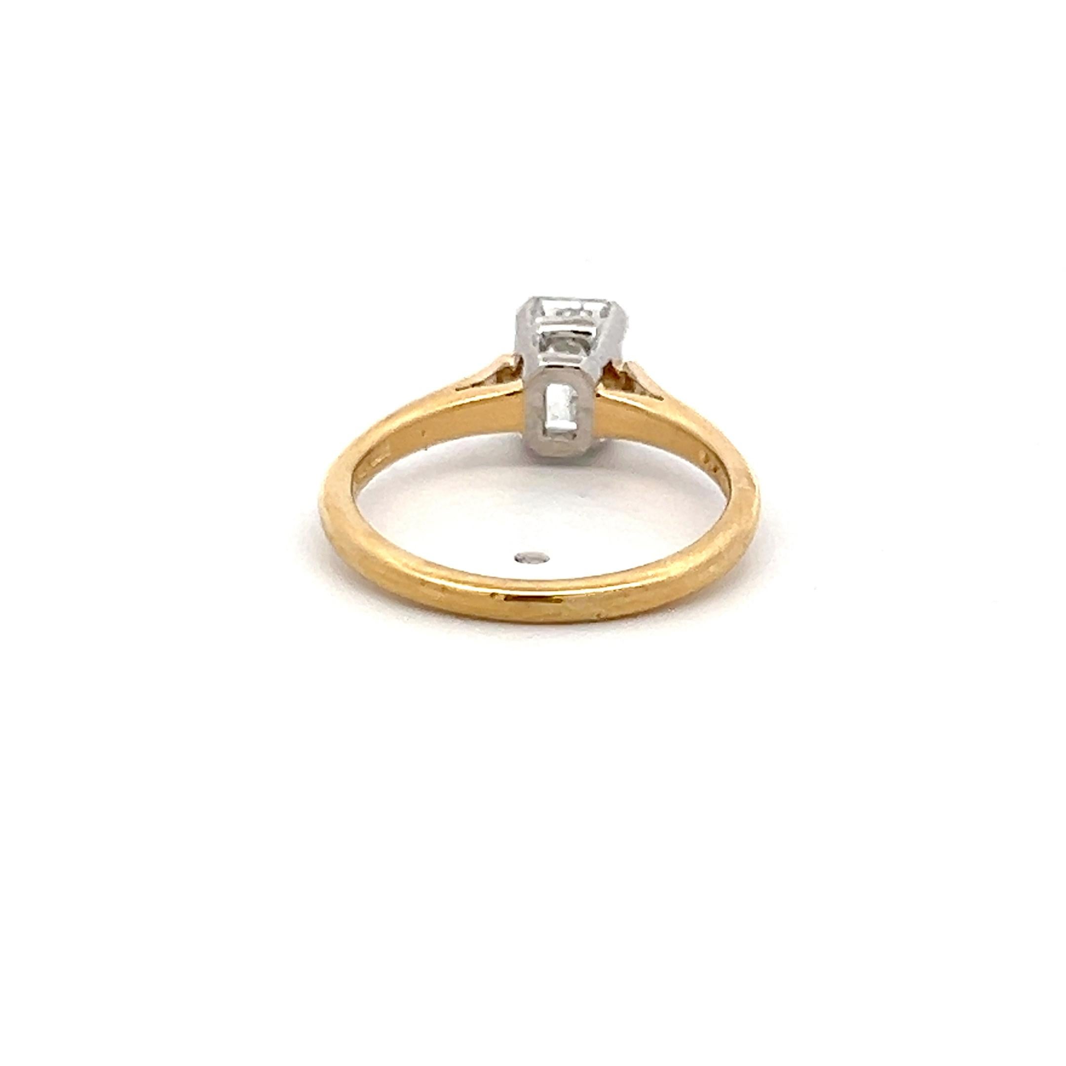 Tiffany & Co 1.02 Carat Emerald Cut Diamond 18K Gold/Platinum Engagement Ring In Good Condition For Sale In New York, NY