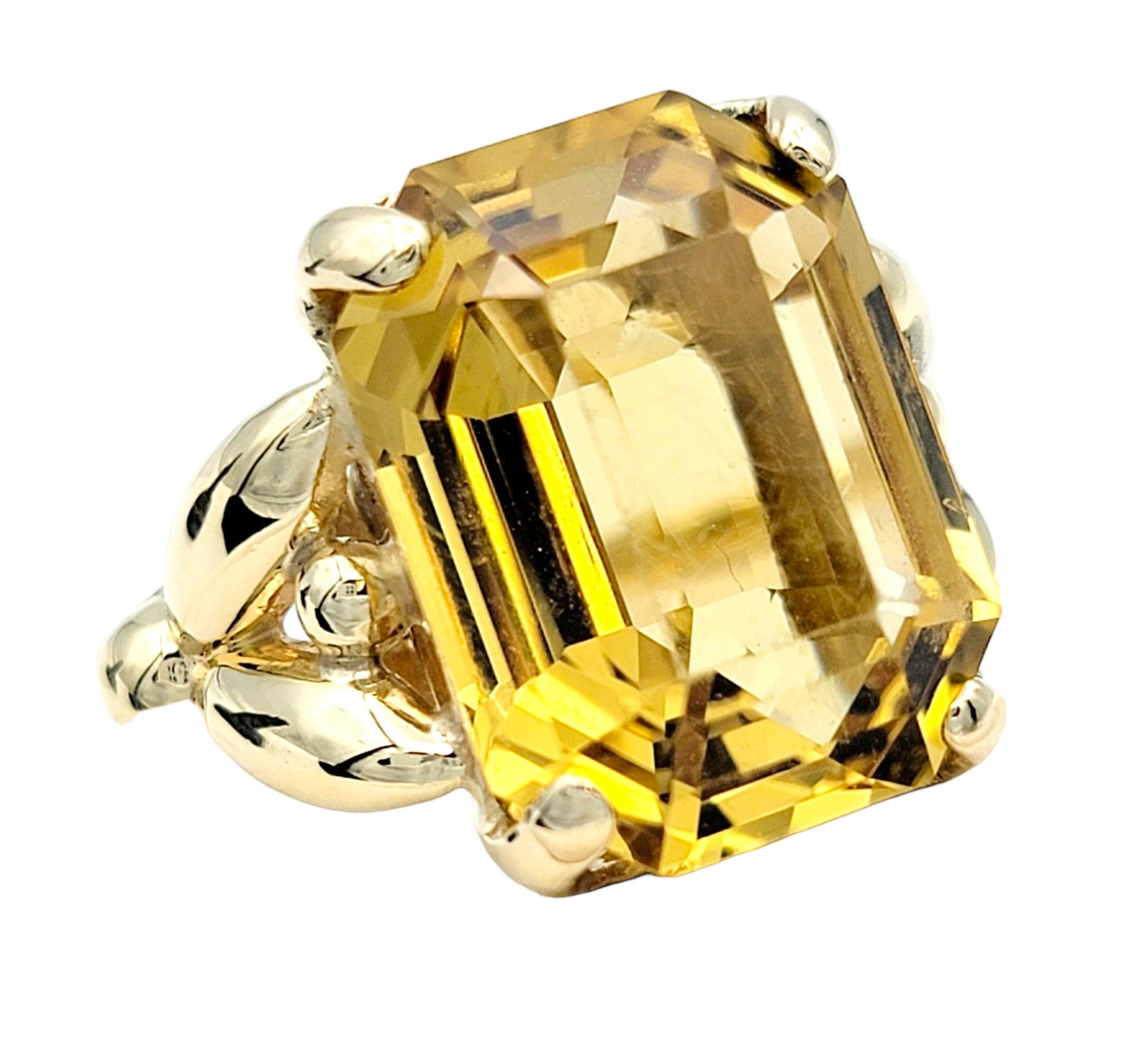 Ring Size: 8.75

This gorgeous Tiffany & Co. citrine cocktail ring, set in 14 karat yellow gold, is a show-stopping piece, combining luxury and elegance in a design that is both bold and sophisticated. The centerpiece of the ring is a remarkable