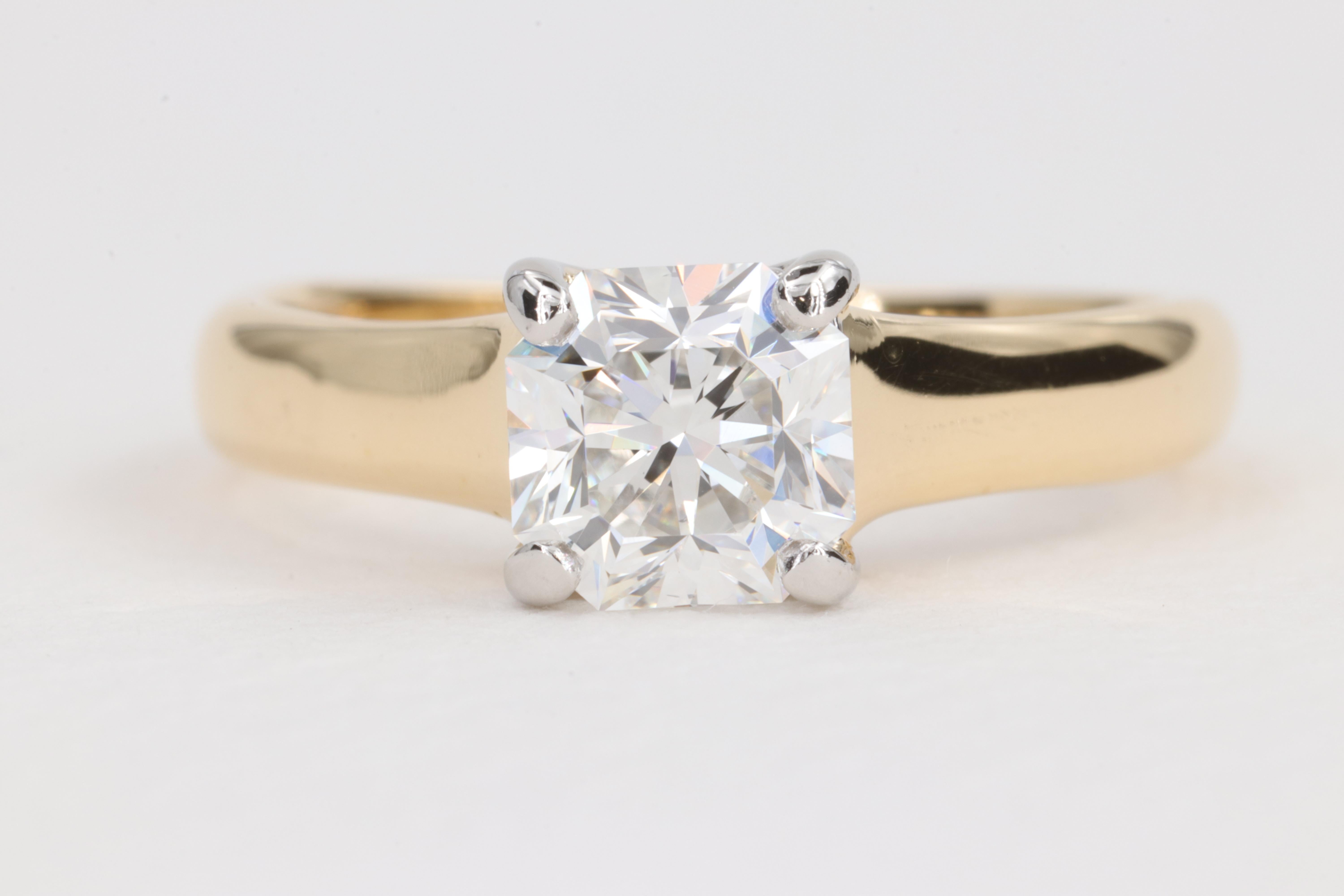Tiffany & Co. 1.02ct Lucida Radiant Cut Diamond Two Tone 18 Karat Yellow Gold & Platinum Engagement Ring

This classic Tiffany & Co. solitaire diamond engagement ring features a colorless 1.02 carat Lucida cut diamond graded F in color and VVS2