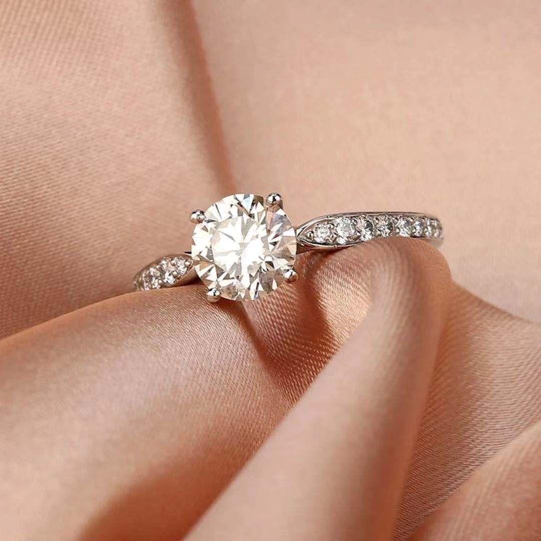 This is a wonderful second hand, Tiffany & Co. engagement ring, which boasts a wonderful centre stone weighing 1.03 carat. The clarity is graded VS1 and the colour I. 

With A Suggested Retail Price Of $21000 / £18000
We got it at a very good price.