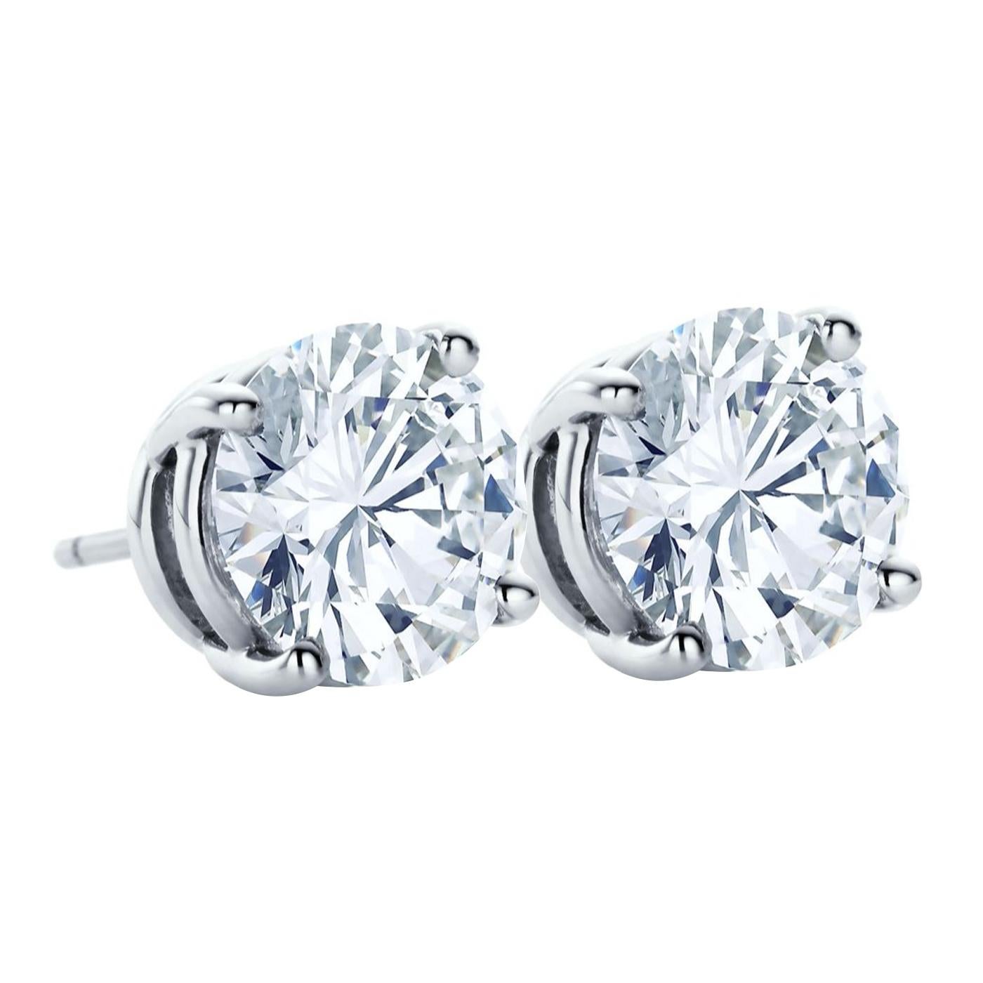 Modernist Tiffany & Co. 1.04ct Round Brilliant Diamond Stud Earrings E Color VS1 Clarity For Sale